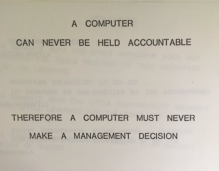 Picture of an IBM presentation slide proclaiming "A COMPUTER CAN NEVER BE HELD ACCOUNTABLE THEREFORE A COMPUTER MUST NEVER MAKE A MANAGEMENT DECISION"